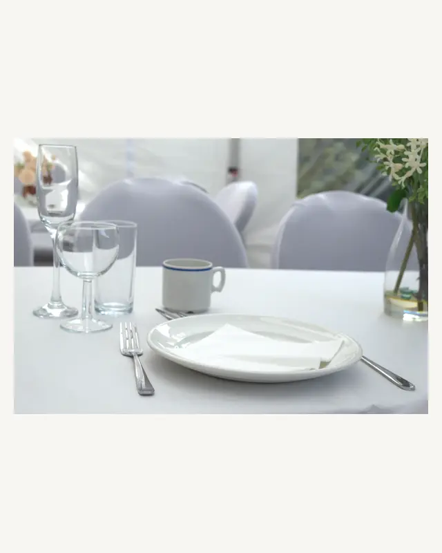 Cutlery and glassware laid out ready for guests